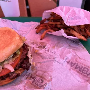 Fries and burger. Hot and juicy with fresh cut fries