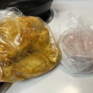Freshly packed Tandoori Chicken and custom handmade Lamb Burgers