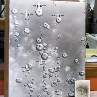 Turn a small photo into a work of art. This 82nd Airborne photo was scanned and then made into a canvas.