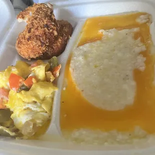 Salmon cakes, eggs and cheese grits