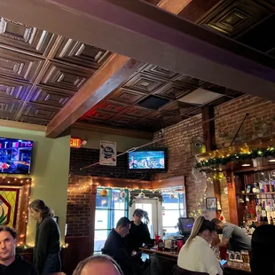 people sitting at the bar