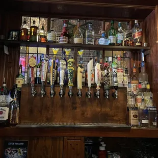 a row of beer taps