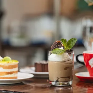 a cup of coffee and a dessert