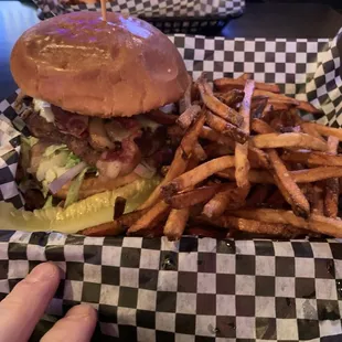 The Thompson Burger. Sautéed mushrooms, Swiss cheese, lots of crispy bacon with lettuce, onion &amp; Tomato.