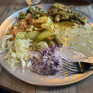 I already ate all the chicken and hummus, but this is the &quot;plate&quot;. It&apos;s a yummy fresh salads &amp; meats.  Mediterranean style food.  Delicious!