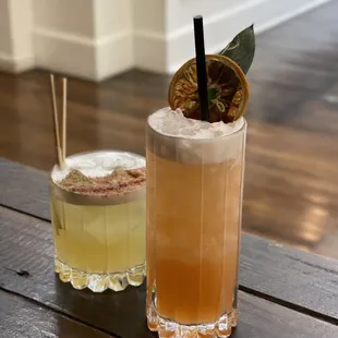 two cocktails on a table
