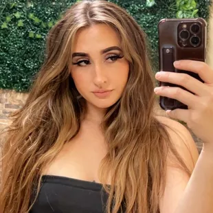 a woman taking a selfie