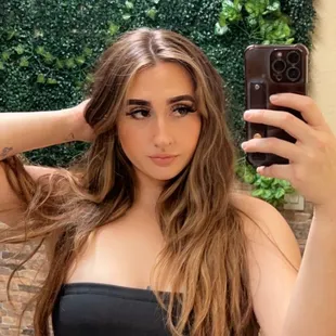 a woman taking a selfie