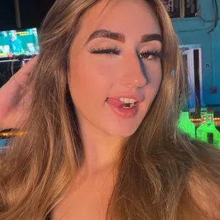 a woman with long blonde hair