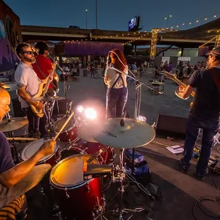 a group of people playing instruments