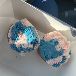 two cupcakes in a box