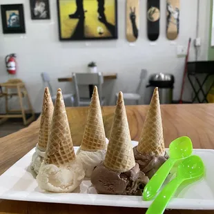 Flight of waffle cones. Mexican chocolate, chocolate, Tahitian vanilla, guava, blueberry cheesecake