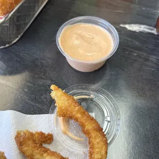 Onion rings and Hammy&apos;s sauce