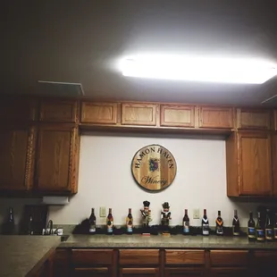 a bar with bottles of wine
