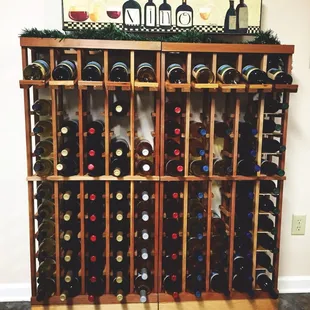 a wine rack full of wine bottles