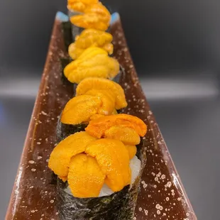 a long row of sushi rolls
