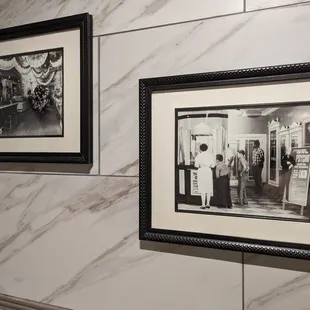 Inside one of the few unisex restrooms. Decorated with black and white photographs of Marietta Square.