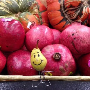 a basket of pomegranates