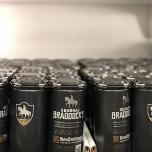 a row of cans of beer