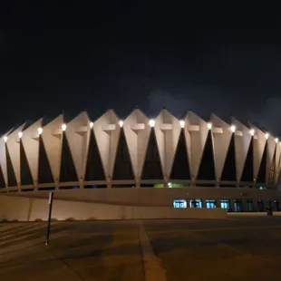 the exterior of the stadium at night