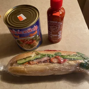 a sub sandwich and condiments