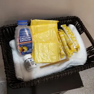 Nice basket of just-in-case, inside ladies bathroom