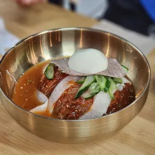 a bowl of meat and vegetables