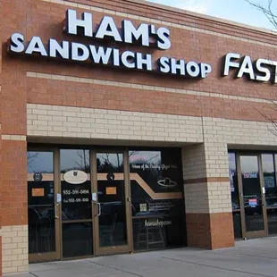 the front of a sandwich shop