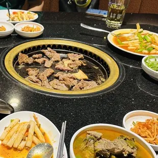 Beef and cabbage stew and toppogi (traditional and not red spicy).  They were  delicately tasteful not overkill w  red spicy paste.