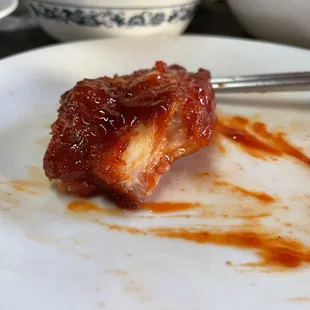 Whole piece of bone and fat, not edible at all