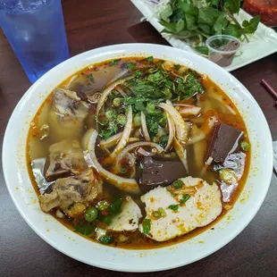 Bun bo hue with shrimp paste on the side
