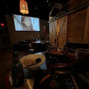 a large screen in the background