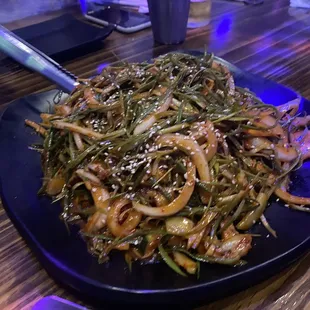 a plate of stir fried vegetables