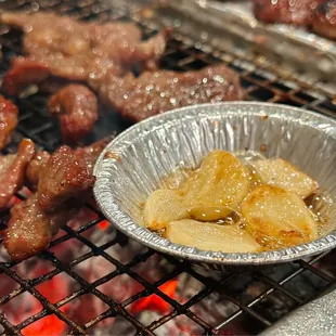 Garlic roasted in sesame oil on the grill.  Proper KBBQ-style ;)