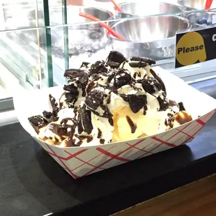 Waffle with vanilla ice cream, banana,Oreo cookies