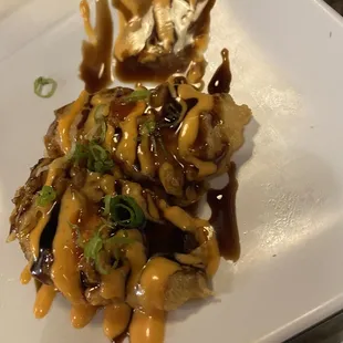 Compliments of the house- albacore wrapped in a light batter and laced with a great spicy sauce.