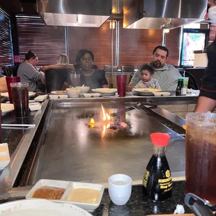 a group of people in a restaurant