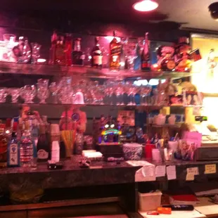 a bar filled with liquor bottles