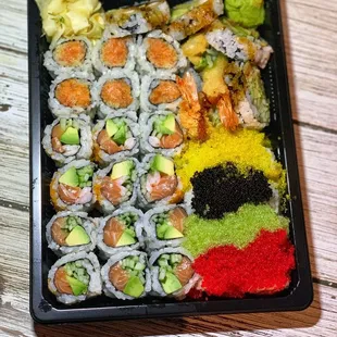 R7. Alaska Roll, R2. New York Roll, R10. Spicy Salmon Roll, A7. Shrimp Tempura, SR8. Tobiko Rainbow Special Roll