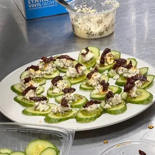 Cucumbers with feta cheese and sun dried tomatoes