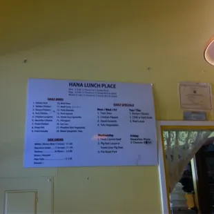 Menu posted on wall. Mini $5, Regular $6, Mixed $7 - 2 choices with rice and salad.