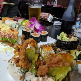 Clockwise from left: Sunfire roll, Rainbow roll, Salmon roll, Salmon Skin roll, and Spider roll. All delicious.