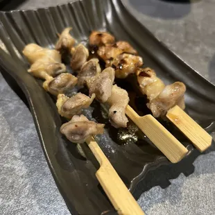 Chicken gizzard with garlic sprout and soy sauce