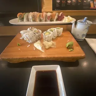 Salmon roll, avocado roll, and rainbow roll.