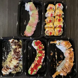 Top: Hamachi Roll and Deep Fried Spicy Tuna Roll Bottom: Crunch Roll, Fire Cracker Roll, Garlic Lovers Roll