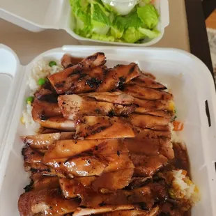 Chicken teriyaki with fried rice.