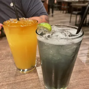 two drinks on a table at a restaurant