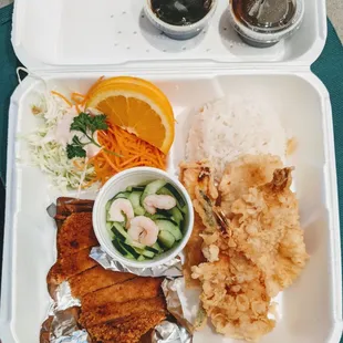 a meal in a styrofoam container