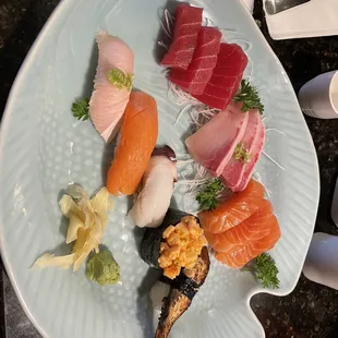 Sashimi plate plus a couple extra pieces of sushi, yellowtail, smoked salmon, octopus, spicy scallop &amp; grilled eel...soooooo good