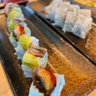 Dragon Roll and Shrimp Tempura Roll.